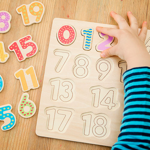 pre-school-child-working-on-number-puzzle